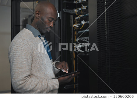 Engineer, server room or black man with tablet for database connection cable, maintenance or software update at night. Cybersecurity, IT and male coder with technology for networking in data center. 130600206