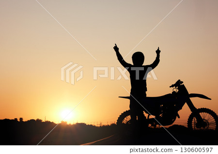 Motorcycle, silhouette and sunset with a sports man outdoor, arms raised in celebration for freedom with mockup. Sky, nature and motorbike with a male rider outside celebrating on a road trip Motorcycle, silhouette and sunset with a sports man outdoor, arms raised in celebration for freedom with mockup. Sky, nature and motorbike with a male rider outside celebrating on a road trip 130600597