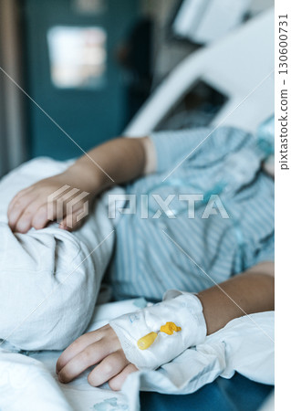 Child Patient Lying in Hospital Therapy Room 130600731