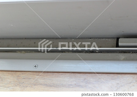 Dust, dirt, accumulated dirt on window sashes 130600768