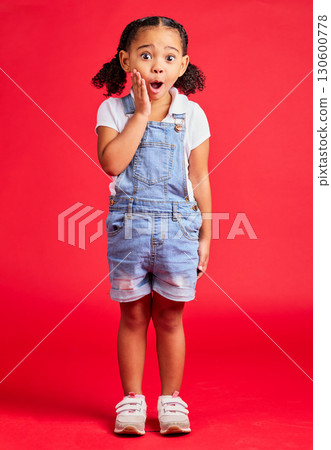 Surprise, wow face and portrait of girl on red background for with omg, comic and shock facial expression. Kids fashion, mockup and cute girl in studio for promotion, sale and discount announcement 130600778