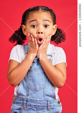 Wow, surprise face and portrait of girl on red background for with omg, comic and shock facial expression. Kids fashion, mockup and cute girl in studio for promotion, sale and discount announcement Wow, surprise face and portrait of girl on red background for with omg, comic and shock facial expression. Kids fashion, mockup and cute girl in studio for promotion, sale and discount announcement 130600860