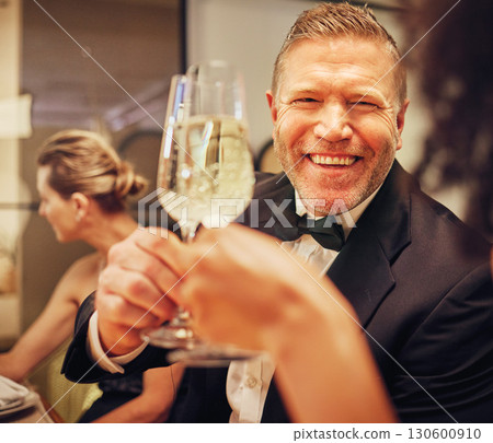 Champagne, cheers celebrate and party with man in suit, smile on face at formal luxury event. Success, bubbly wine and happy people celebration of achievement or birthday, toast with glass of bubbles 130600910