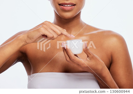 Cream, jar and woman skincare for face, body and cosmetics in studio, isolated and white background. Facial lotion, beauty product and model with container for healthy glow, shine or aesthetic makeup 130600944