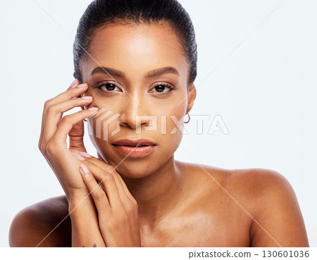 Black woman, skincare and beauty portrait in studio for dermatology, cosmetics and natural skin. Aesthetic model person with hands for spa facial and healthy glow isolated on a white background Black woman, skincare and beauty portrait in studio for dermatology, cosmetics and natural skin. Aesthetic model person with hands for spa facial and healthy glow isolated on a white background 130601036