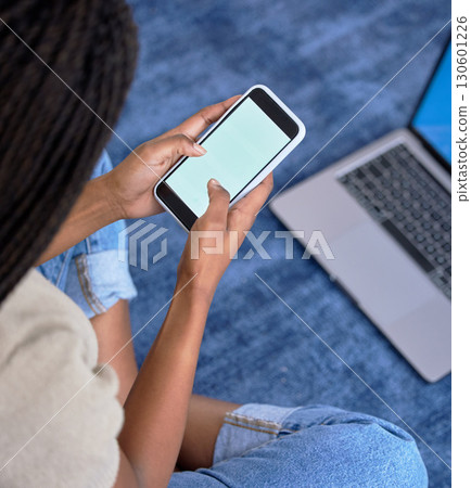 Hands typing, phone screen and mockup in home for marketing, advertising or promotion. Tech, branding and female or black woman with mobile smartphone for copy space or product placement in house. Hands typing, phone screen and mockup in home for marketing, advertising or promotion. Tech, branding and female or black woman with mobile smartphone for copy space or product placement in house. 130601226