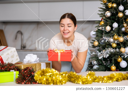 prepearing for New Year and preparing surprises, girl picked up most beautiful gift 130601227