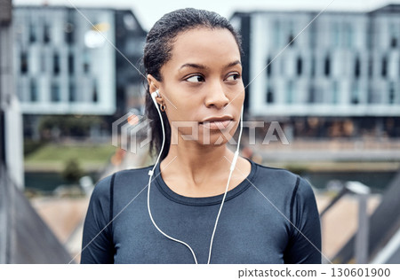 Music, fitness and face of black woman in city for wellness, healthy body and cardio workout in urban town. Sports, thinking and girl listening to audio for exercise, running and marathon training 130601900