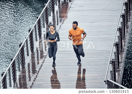 Top view, run or couple training, seaside or workout for wellness, healthy lifestyle or practice together. Running, black man or woman with exercise, promenade or performance with endurance or energy Top view, run or couple training, seaside or workout for wellness, healthy lifestyle or practice together. Running, black man or woman with exercise, promenade or performance with endurance or energy 130601915