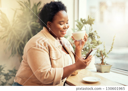 Coffee shop, phone and communication with a black woman customer drinking while typing a text message by a window. Internet cafe, mobile or social media with a female enjoying a drink in a restaurant 130601965