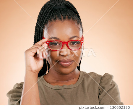Black woman in portrait with face, holding glasses with vision and prescription lens isolated on studio background. Eyewear, eye care and health, smart girl with red fashion frame and optical mockup Black woman in portrait with face, holding glasses with vision and prescription lens isolated on studio background. Eyewear, eye care and health, smart girl with red fashion frame and optical mockup 130602350