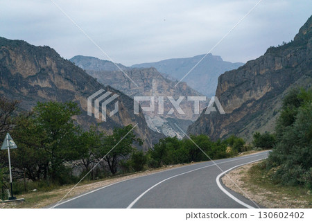 View from the car of an asphalt road in the mountainous area of Dagestan View from the car of an asphalt road in the mountainous area of Dagestan 130602402