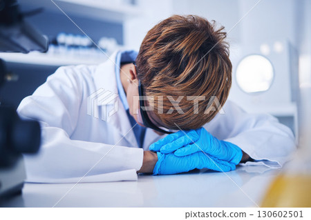 Depression or black woman scientist with stress for medical crisis, medicine research fail error in lab. Sad, tired or frustrated nurse for healthcare anxiety, work burnout or mental health 130602501