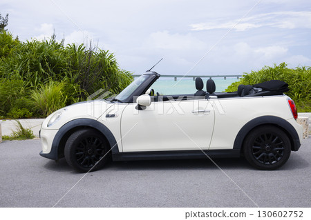 A young woman driving 130602752