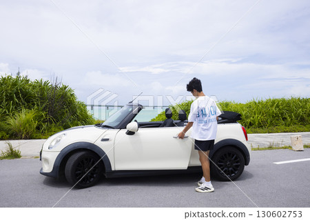 Young man driving 130602753