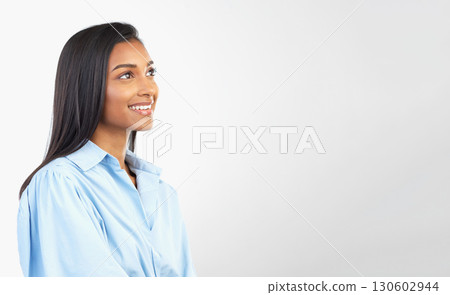 Mockup space, thinking and Indian woman on a white background for brainstorming, ideas and vision. Copyspace, blank advertising and happy girl with smile for product placement, branding and promotion 130602944