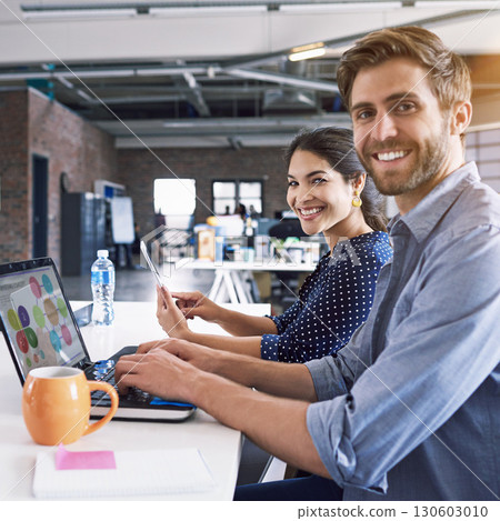 Smile, office and portrait of man and woman at desk with laptop at creative agency, working on project together. Leadership, partnership and happy employees or business partner at design startup. 130603010