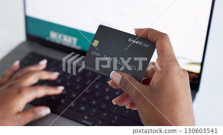 Ecommerce, credit card and hands on laptop for online shopping, internet payment and banking. Fintech, ecommerce and closeup of person on computer for purchase, order on website and paying bills Ecommerce, credit card and hands on laptop for online shopping, internet payment and banking. Fintech, ecommerce and closeup of person on computer for purchase, order on website and paying bills 130603541