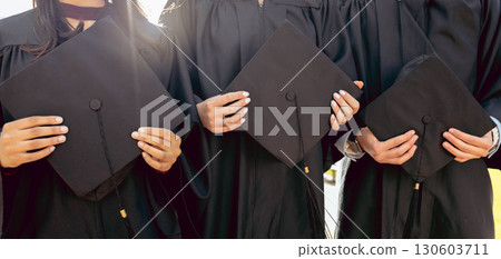 University student group, hands and holding graduation cap together in queue, cropped and success for study goal. Friends, students and graduate celebration for education, learning and future career University student group, hands and holding graduation cap together in queue, cropped and success for study goal. Friends, students and graduate celebration for education, learning and future career 130603711