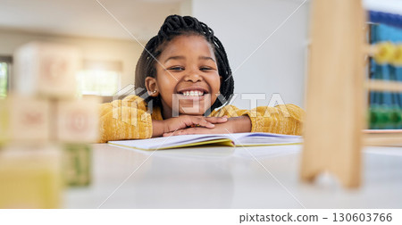 Education, child and girl writing at table for homework, lesson and home school activity in her house. Learning, student and child development, student and distance learning, smile and happy drawing 130603766