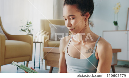 Meditation, pilates and home yoga for black woman working on spiritual chakra peace, freedom of the mind and zen mindset. Body health, wellness lifestyle and relax girl training on living room floor Meditation, pilates and home yoga for black woman working on spiritual chakra peace, freedom of the mind and zen mindset. Body health, wellness lifestyle and relax girl training on living room floor 130603779