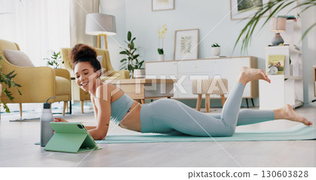 Training, yoga or meditation with woman, tablet and workout with wellness, training and digital apps in living room. Girl, technology or person with exercise, home and fitness with health or internet Training, yoga or meditation with woman, tablet and workout with wellness, training and digital apps in living room. Girl, technology or person with exercise, home and fitness with health or internet 130603828