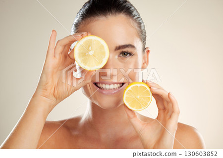 Skincare, face portrait and happy woman with lemon for natural fruit detox, health wellness or facial beauty glow. Spa salon, dermatology healthcare and nutritionist model with vitamin c food product Skincare, face portrait and happy woman with lemon for natural fruit detox, health wellness or facial beauty glow. Spa salon, dermatology healthcare and nutritionist model with vitamin c food product 130603852