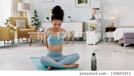 Fitness, yoga and woman stretching in exercise, zen workout or meditation on living room floor at home. Female person or yogi in warm up training, spiritual wellness or healthy body on mat in house Fitness, yoga and woman stretching in exercise, zen workout or meditation on living room floor at home. Female person or yogi in warm up training, spiritual wellness or healthy body on mat in house 130603853