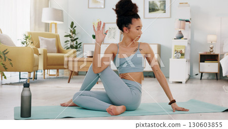Fitness, yoga and woman stretching body in zen exercise or spiritual wellness on living room floor at home. Female person or yogi in warm up, training or workout for healthy wellness on mat in house Fitness, yoga and woman stretching body in zen exercise or spiritual wellness on living room floor at home. Female person or yogi in warm up, training or workout for healthy wellness on mat in house 130603855
