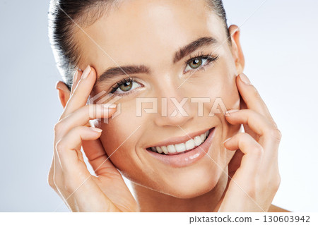 Portrait, face and beauty skincare for skin glow on a woman isolated against a studio white background. Cosmetic, teeth and happy girl wellness model with a natural smooth and smiling for dermatology 130603942