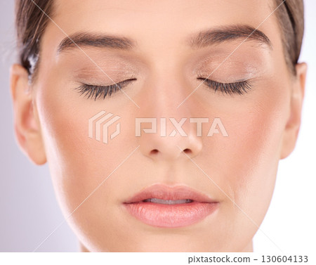Woman, face and eyes closed for makeup, cosmetics and laser transformation on studio background. Closeup female model, facial aesthetic and skincare of botox, beauty glow and chemical peel results Woman, face and eyes closed for makeup, cosmetics and laser transformation on studio background. Closeup female model, facial aesthetic and skincare of botox, beauty glow and chemical peel results 130604133