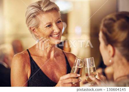 Success, happy or women toast in a party for goals, winning or new year at luxury social event. Mature, celebration or senior friends cheers with champagne drinks or wine glasses at a fun dinner gala Success, happy or women toast in a party for goals, winning or new year at luxury social event. Mature, celebration or senior friends cheers with champagne drinks or wine glasses at a fun dinner gala 130604145