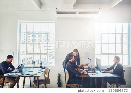 Coaching, training and business people on computer pointing in office. Teamwork, collaboration and mature manager on pc helping coworker with advertising proposal, marketing report or sales project. Coaching, training and business people on computer pointing in office. Teamwork, collaboration and mature manager on pc helping coworker with advertising proposal, marketing report or sales project. 130604272