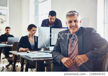 Senior, portrait and business man in office or company workplace. Leadership, ceo and happy elderly male employee or manager with colleagues working on marketing report, advertising or sales project. Senior, portrait and business man in office or company workplace. Leadership, ceo and happy elderly male employee or manager with colleagues working on marketing report, advertising or sales project. 130604281