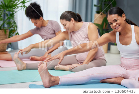 Portrait, friends and yoga by women stretch on floor for fitness, exercise and wellness, happy and relax. Flexible, women and female group stretching for pilates workout, cardio and healthy lifestyle 130604433