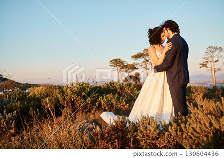 Intimate, wedding couple and hug in nature with mock up of marriage celebration in Africa outdoor. Commitment, save the date and love with bride, man and calm embrace with blue sky together in union 130604436