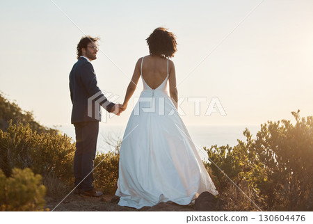 Love, wedding and holding hands with couple in nature park for celebration, romance and happiness. Sunset, support and summer with bride and groom in countryside for marriage, ceremony and bonding Love, wedding and holding hands with couple in nature park for celebration, romance and happiness. Sunset, support and summer with bride and groom in countryside for marriage, ceremony and bonding 130604476