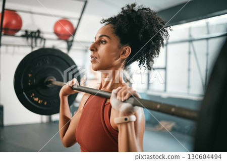 Gym exercise, barbell workout or black woman doing muscle strength training, fitness or bodybuilding. Strong girl, health lifestyle or powerlifting sports athlete, person or bodybuilder weightlifting 130604494