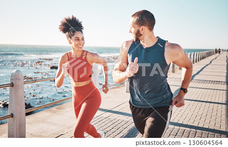 Running, exercise and training with a sports couple outdoor in summer for a cardio or endurance workout. Health, fitness and ocean with a man and woman runner on a promenade for a challenge together 130604564