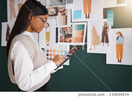 Fashion, designer with Indian woman and tablet, sketch on digital device with tech and design in workshop. Focus, creative with professional tailor and small business owner, drawing in workspace Fashion, designer with Indian woman and tablet, sketch on digital device with tech and design in workshop. Focus, creative with professional tailor and small business owner, drawing in workspace 130604634
