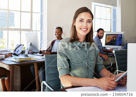 Portrait of woman in creative agency with smile, staff and tablet, success at design startup. Happy designer in modern office, manager or team leader working at laptop at desk with digital technology Portrait of woman in creative agency with smile, staff and tablet, success at design startup. Happy designer in modern office, manager or team leader working at laptop at desk with digital technology 130604716