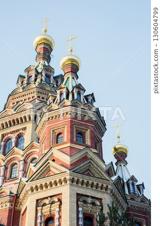 The Cathedral of Saints Peter and Paul is under blue sky, vertical photo 130604799