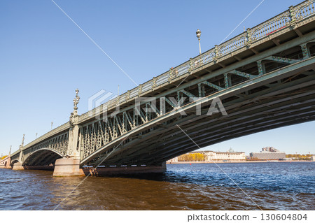 Close-up view of the Trinity Bridge on a sunny day, St-Petersburg Close-up view of the Trinity Bridge on a sunny day, St-Petersburg 130604804