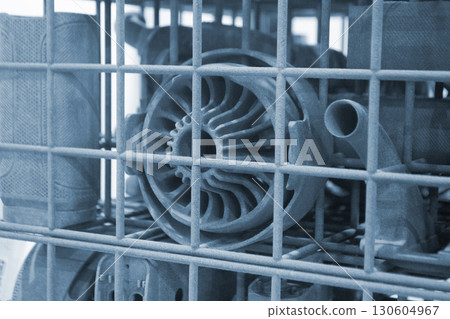 Object printed on 3D printer from molten plastic powder close-up. Model printed on 3D printer from melted polyamide powder. New modern additive 3D printing technology. Multi Jet Fusion MJF technology 130604967