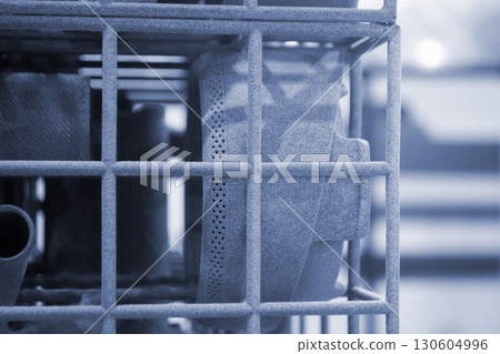 Object printed on 3D printer from molten plastic powder close-up. Model printed on 3D printer from melted polyamide powder. New modern additive 3D printing technology. Multi Jet Fusion MJF technology 130604996