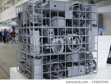 Object printed on 3D printer from molten plastic powder close-up. Model printed on 3D printer from melted polyamide powder. New modern additive 3D printing technology. Multi Jet Fusion MJF technology 130605089