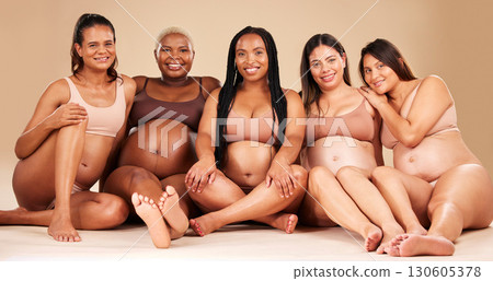 Portrait, bonding and pregnant women sitting on floor in community, diversity support or body empowerment. Smile, happy and pregnancy friends in underwear for healthcare wellness, future baby or love Portrait, bonding and pregnant women sitting on floor in community, diversity support or body empowerment. Smile, happy and pregnancy friends in underwear for healthcare wellness, future baby or love 130605378