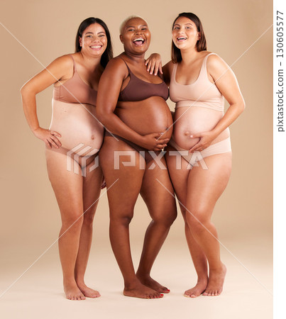 Pregnant body, portrait or laughing women on studio background in diversity empowerment, baby support and community. Smile, happy or pregnancy friends in underwear with stomach in funny or comic joke 130605577