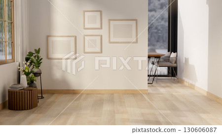 Empty frames hanging on white wall of a living room and a wooden floor corridor. Gallery photo wall. 130606087