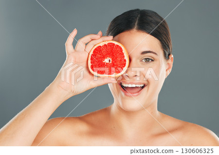 Grapefruit, skincare, woman or aesthetic wellness for healthy diet, happy results or clean glowing on grey background. Beauty portrait, smile or girl model face, facial makeup or cosmetics for health 130606325